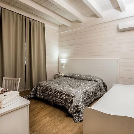 Bed and Breakfast Le Camelie Джиноза-Марина Экстерьер фото