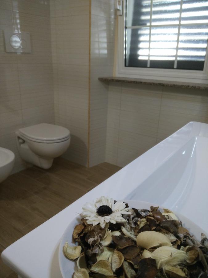 Bed and Breakfast Le Camelie Джиноза-Марина Экстерьер фото