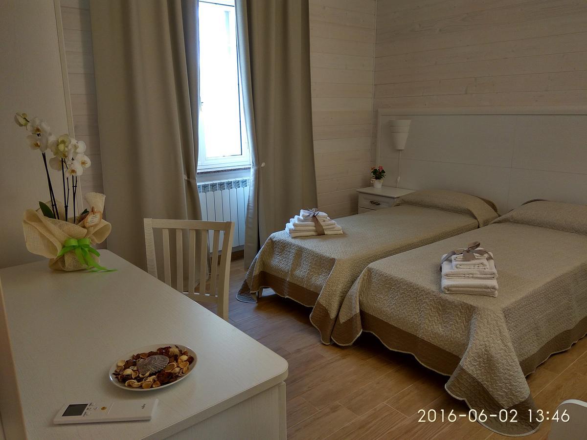 Bed and Breakfast Le Camelie Джиноза-Марина Экстерьер фото