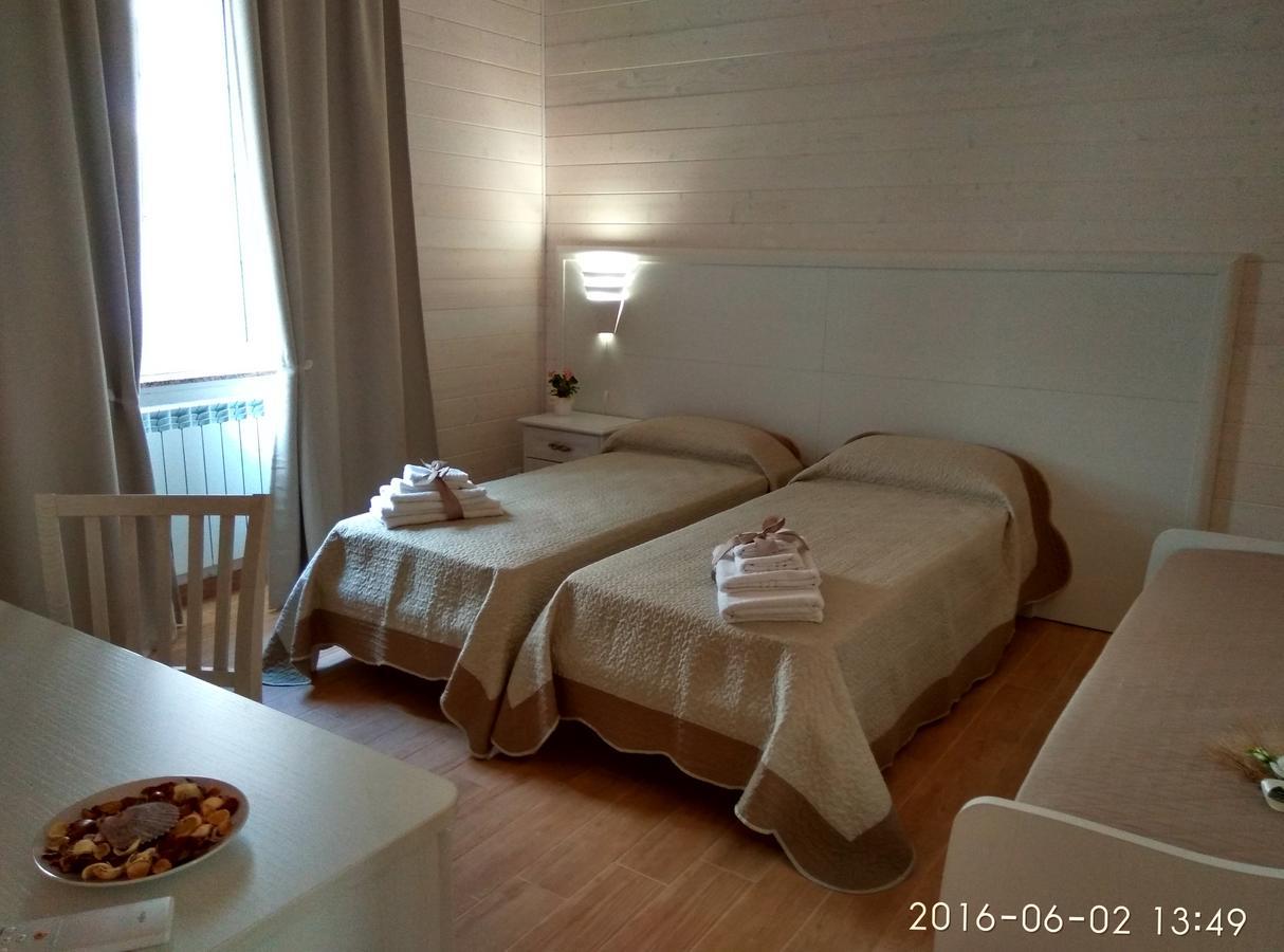 Bed and Breakfast Le Camelie Джиноза-Марина Экстерьер фото
