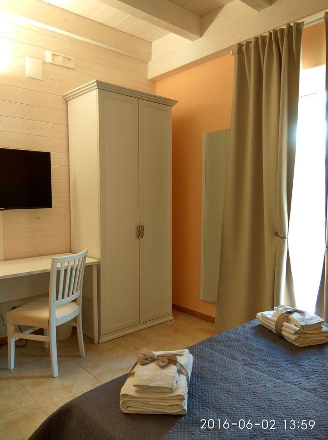 Bed and Breakfast Le Camelie Джиноза-Марина Номер фото