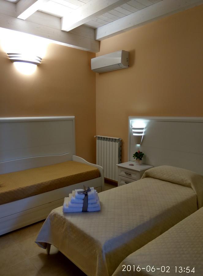 Bed and Breakfast Le Camelie Джиноза-Марина Номер фото