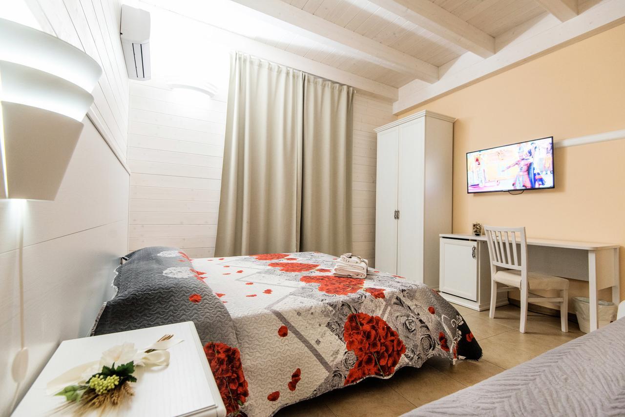 Bed and Breakfast Le Camelie Джиноза-Марина Экстерьер фото