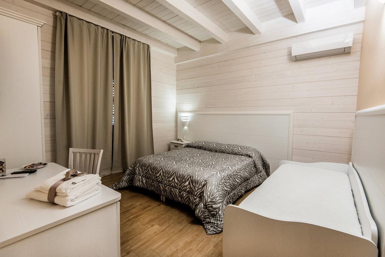 Bed and Breakfast Le Camelie Джиноза-Марина Экстерьер фото